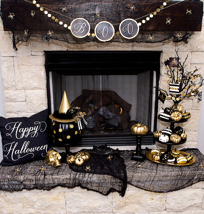 Black and gold halloween mantel