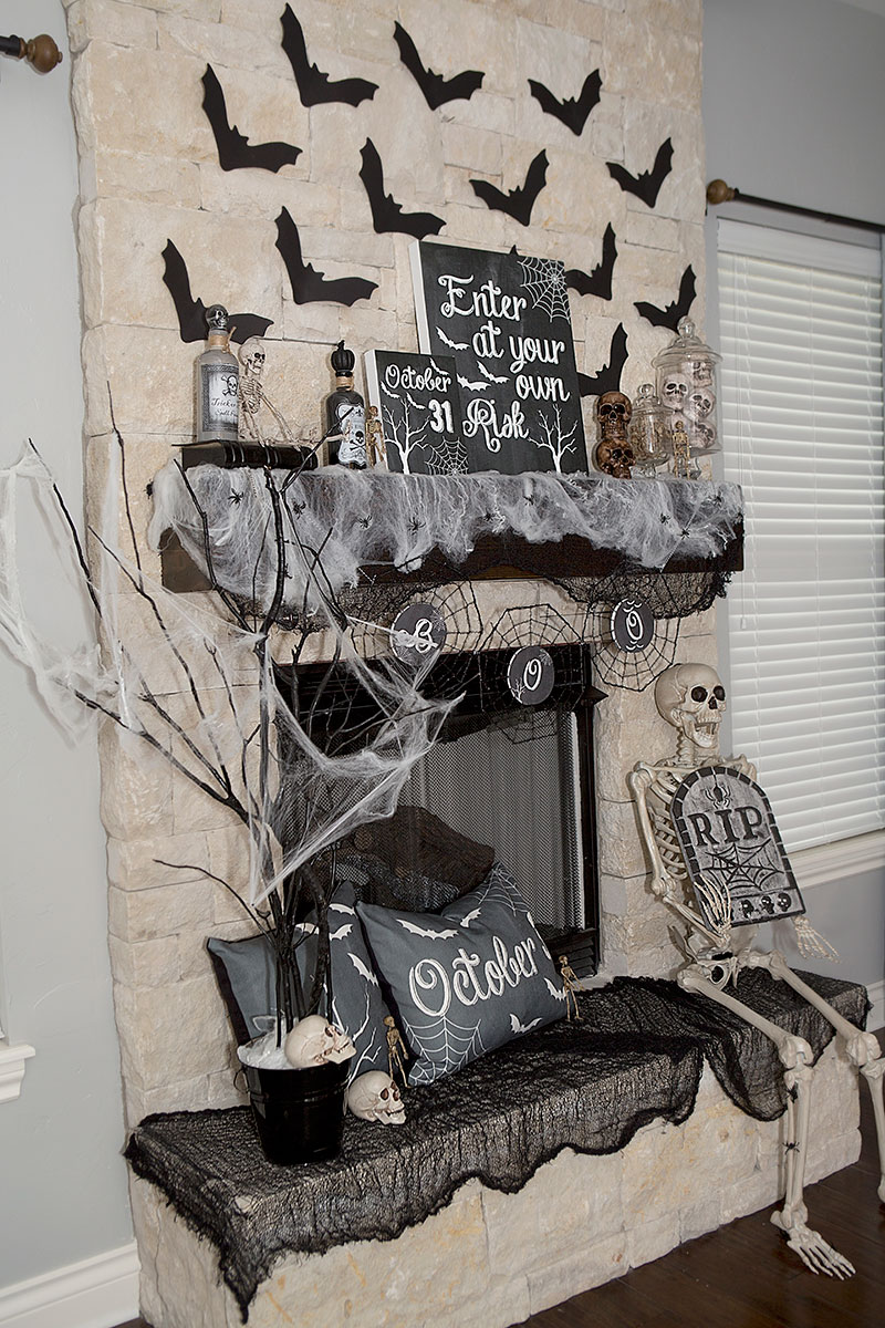 black and white halloween mantel