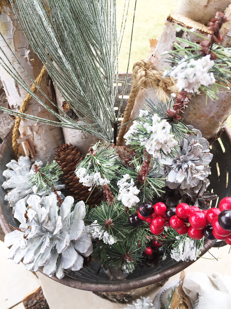 Rustic Christmas Decorations in a vintage farmhouse bucket. 